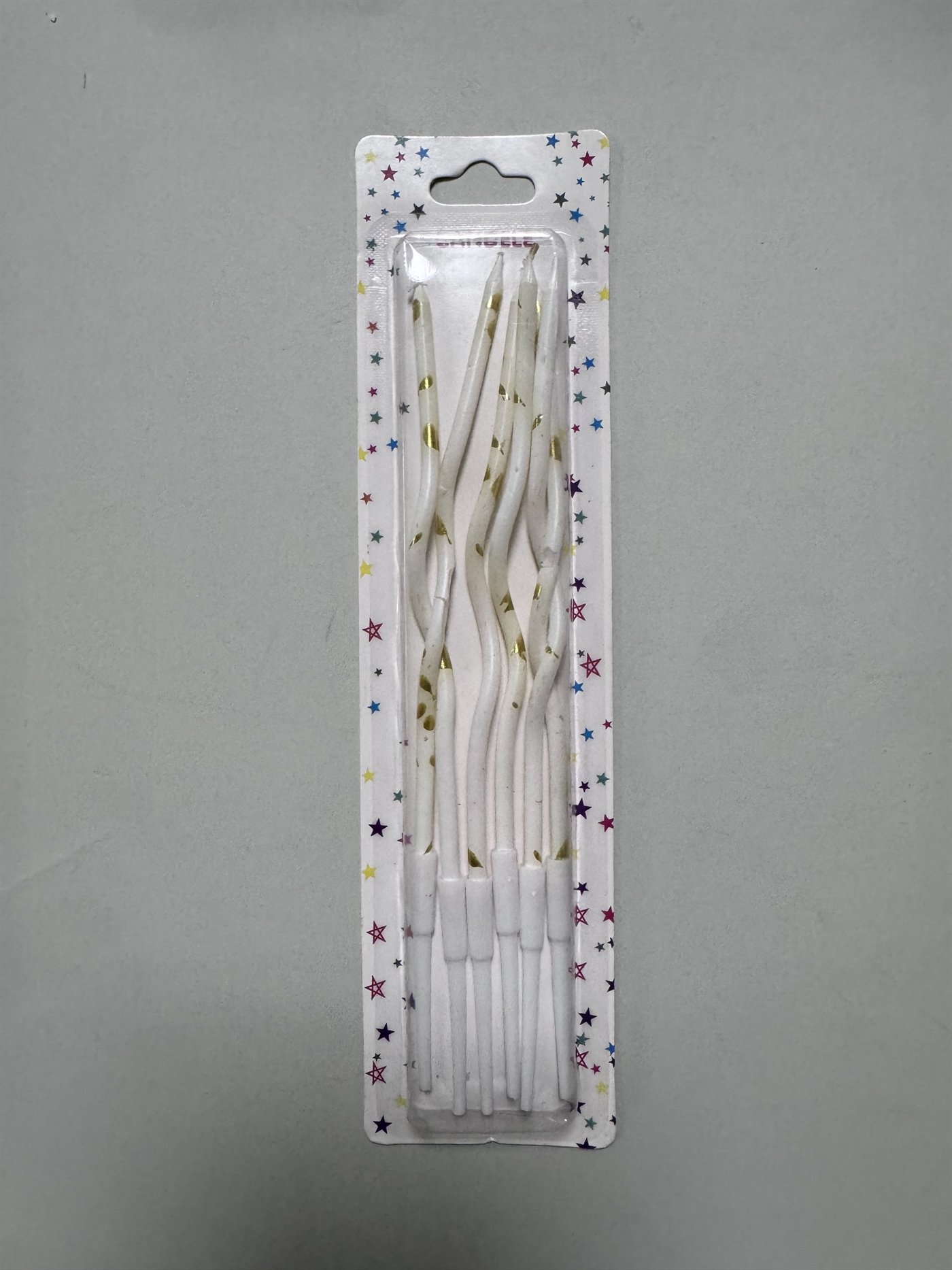 White and gold wavy birthday candles